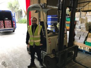 Volunteer with forklift